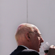 Sir Clive Sinclair having a drink of wine